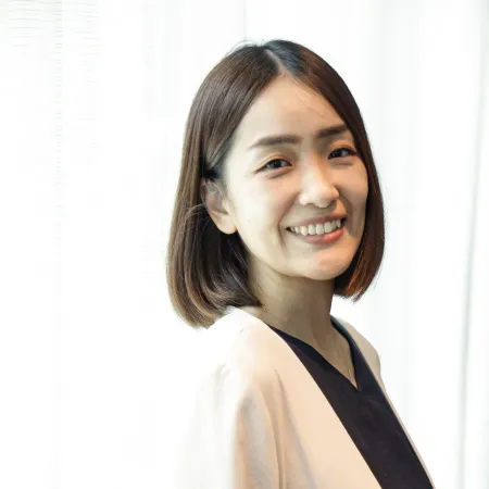 Headshot of Machiko Kono smiling at the camera